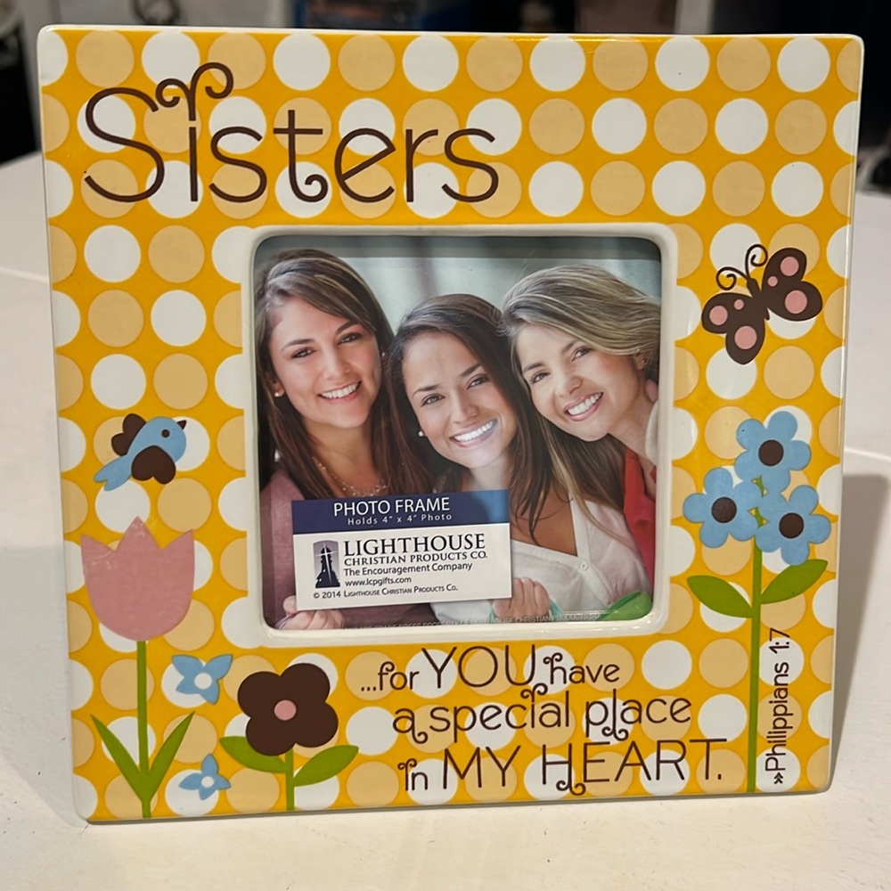 Sisters photo frame holds 4 x 4 photo